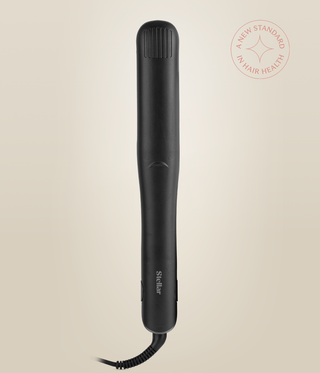 Front view of the closed Astral Black Omnia Styler Plus, with Stellar logo and cord.