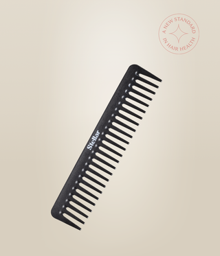 Black Carbon Dressing Comb shown diagonally, with wide teeth and a white Stellar logo.