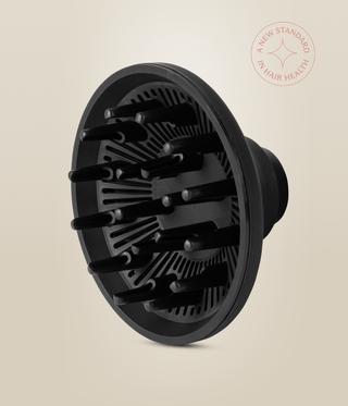Angled view of the black OmniFlex Dryer diffuser, showing its long fingers and rear attachment.