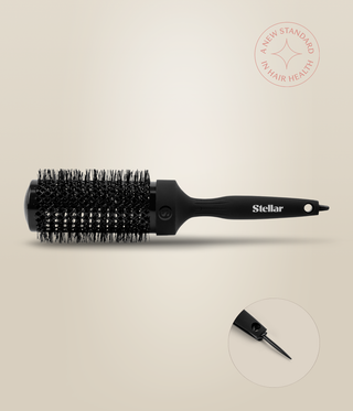 Side view of a wide black HeatSense Round Brush, with an inset showing the extended sectioning pin.